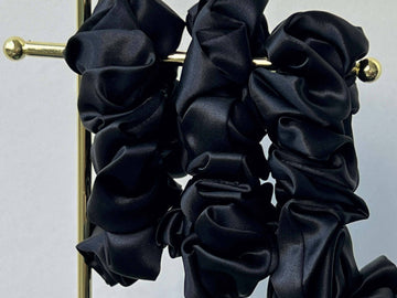 Save yourself from hair breakage and knots and allow our silky scrunchies to improve the quality of your hair's life! We use the highest quality (6A) 100% Mulberry silk that helps to ensure your endless experience. Antibacterial, hypoallergenic, and Hyaluronic Acid infused scrunchies.