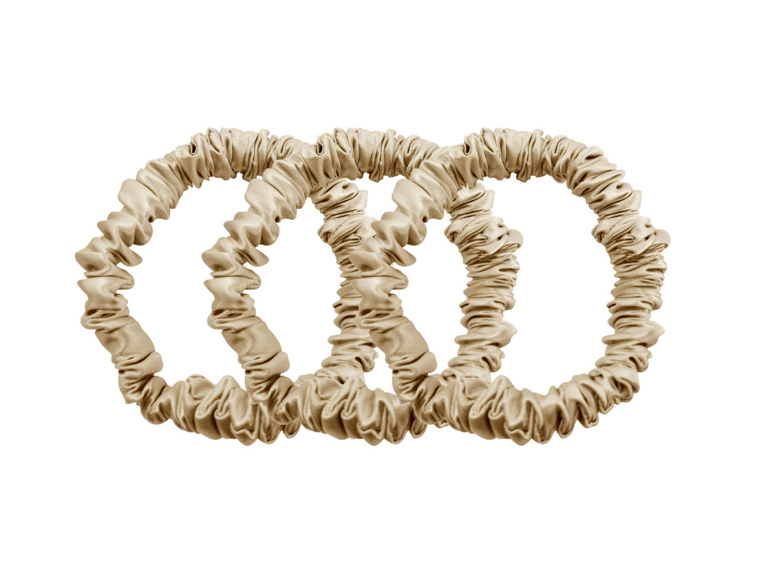 Save yourself from hair breakage and knots and allow our silky scrunchies to improve the quality of your hair's life! We use the highest quality (6A) 100% Mulberry silk that helps to ensure your endless experience. Antibacterial, hypoallergenic, and Hyaluronic Acid infused scrunchies.