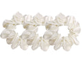 Save yourself from hair breakage and knots and allow our silky scrunchies to improve the quality of your hair's life! We use the highest quality (6A) 100% Mulberry silk that helps to ensure your endless experience. Antibacterial, hypoallergenic, and Hyaluronic Acid infused scrunchies.