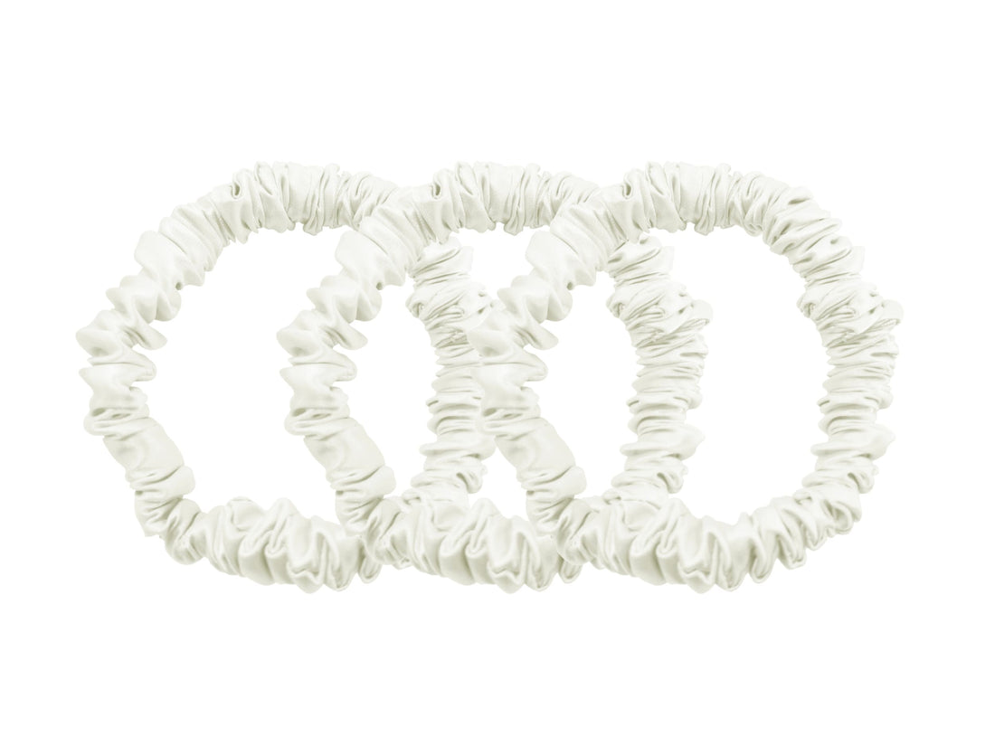 Save yourself from hair breakage and knots and allow our silky scrunchies to improve the quality of your hair's life! We use the highest quality (6A) 100% Mulberry silk that helps to ensure your endless experience. Antibacterial, hypoallergenic, and Hyaluronic Acid infused scrunchies.