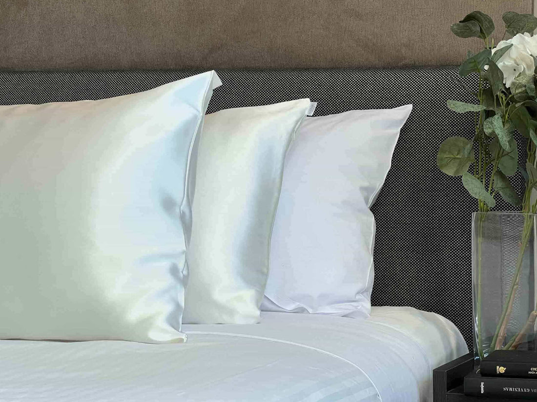 Get the beauty sleep you deserve with our Hyaluronic Acid Infused Silk Pillowcases. The silky smooth fabric is gentle on your skin and hair while the infused Hyaluronic Acid provides hydration, leaving you with a refreshed and rejuvenated complexion. Say goodbye to bed head and wake up to a glowing complexion every morning.