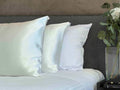 Get the beauty sleep you deserve with our Hyaluronic Acid Infused Silk Pillowcases. The silky smooth fabric is gentle on your skin and hair while the infused Hyaluronic Acid provides hydration, leaving you with a refreshed and rejuvenated complexion. Say goodbye to bed head and wake up to a glowing complexion every morning.