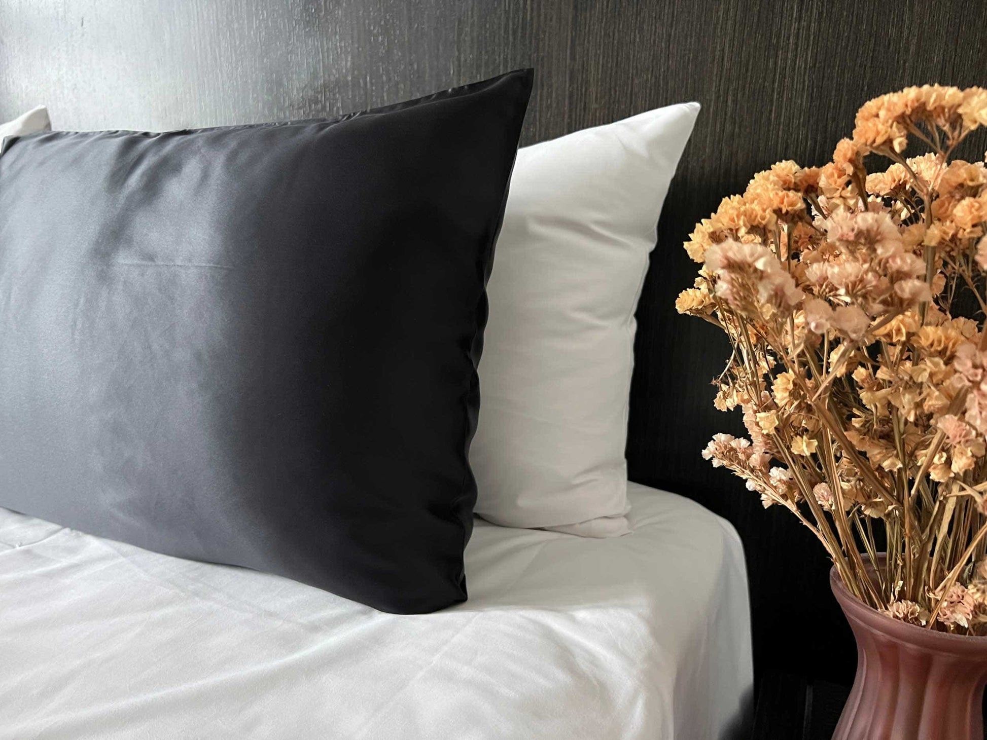 Get the beauty sleep you deserve with our Hyaluronic Acid Infused Silk Pillowcase. The silky smooth fabric is gentle on your skin and hair while the infused hyaluronic acid provides hydration, leaving you with a refreshed and rejuvenated complexion. Say goodbye to bed head and wake up to a glowing complexion every morning.