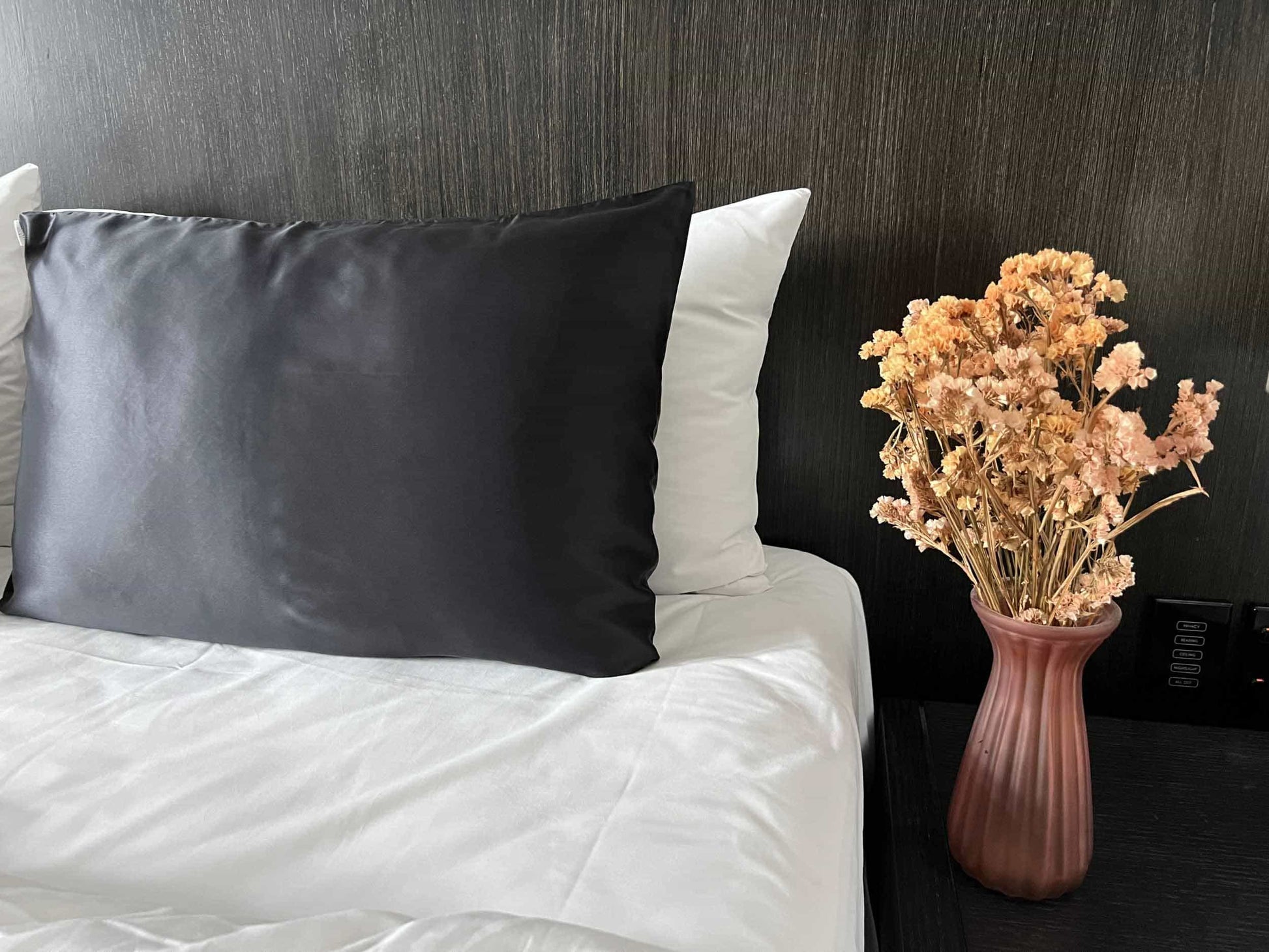 Get the beauty sleep you deserve with our Hyaluronic Acid Infused Silk Pillowcase. The silky smooth fabric is gentle on your skin and hair while the infused hyaluronic acid provides hydration, leaving you with a refreshed and rejuvenated complexion. Say goodbye to bed head and wake up to a glowing complexion every morning.