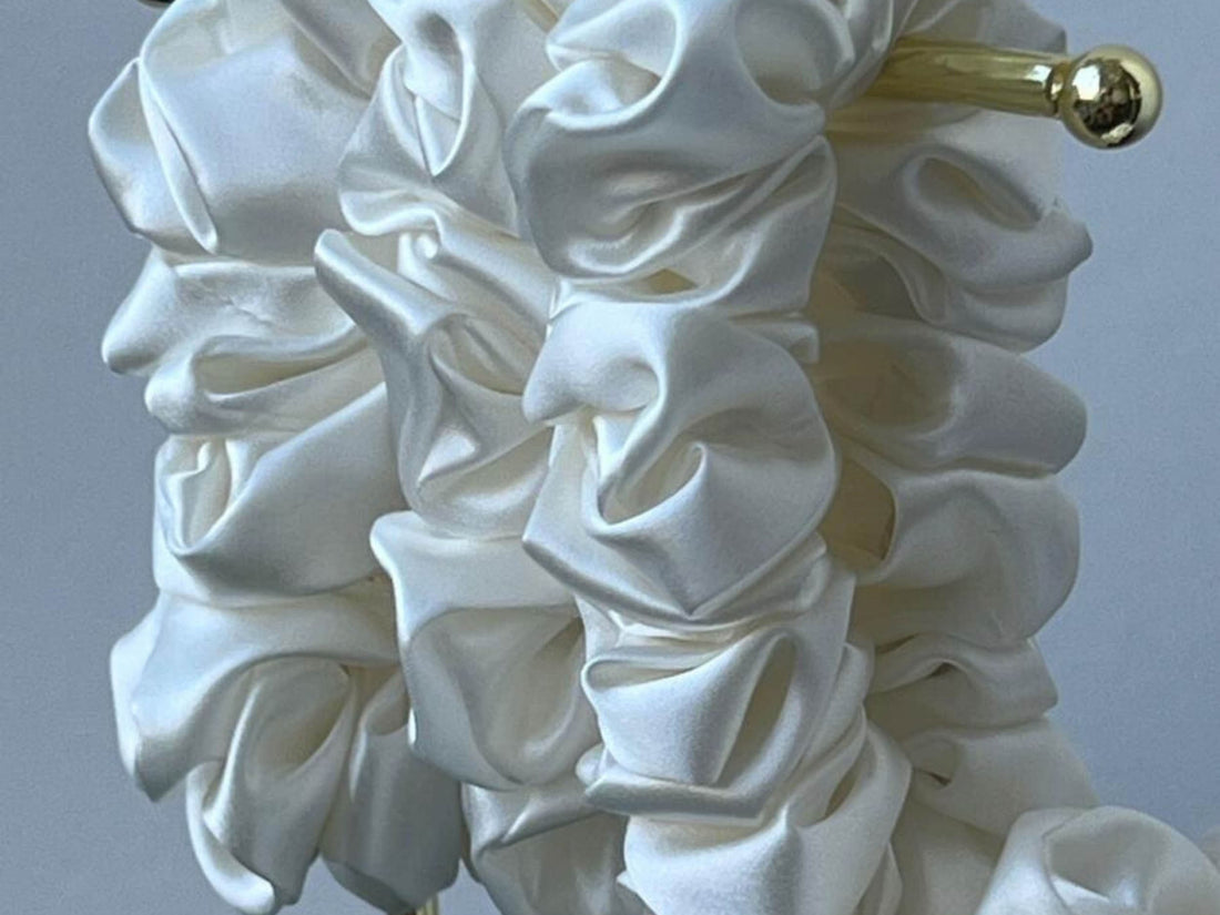 Save yourself from hair breakage and knots and allow our silky scrunchies to improve the quality of your hair's life! We use the highest quality (6A) 100% Mulberry silk that helps to ensure your endless experience. Antibacterial, hypoallergenic, and Hyaluronic Acid infused scrunchies.