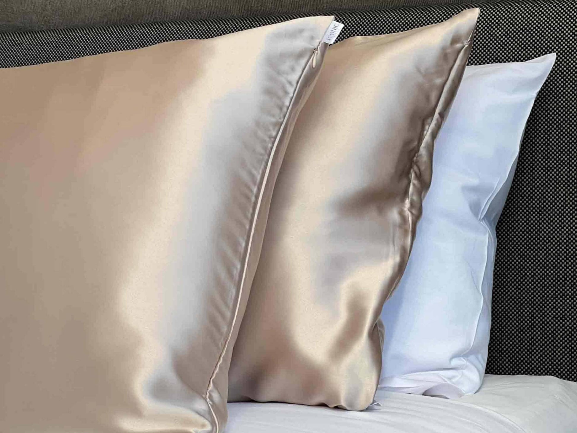 Get the beauty sleep you deserve with our Hyaluronic Acid Infused Silk Pillowcases. The silky smooth fabric is gentle on your skin and hair while the infused Hyaluronic Acid provides hydration, leaving you with a refreshed and rejuvenated complexion. Say goodbye to bed head and wake up to a glowing complexion every morning.