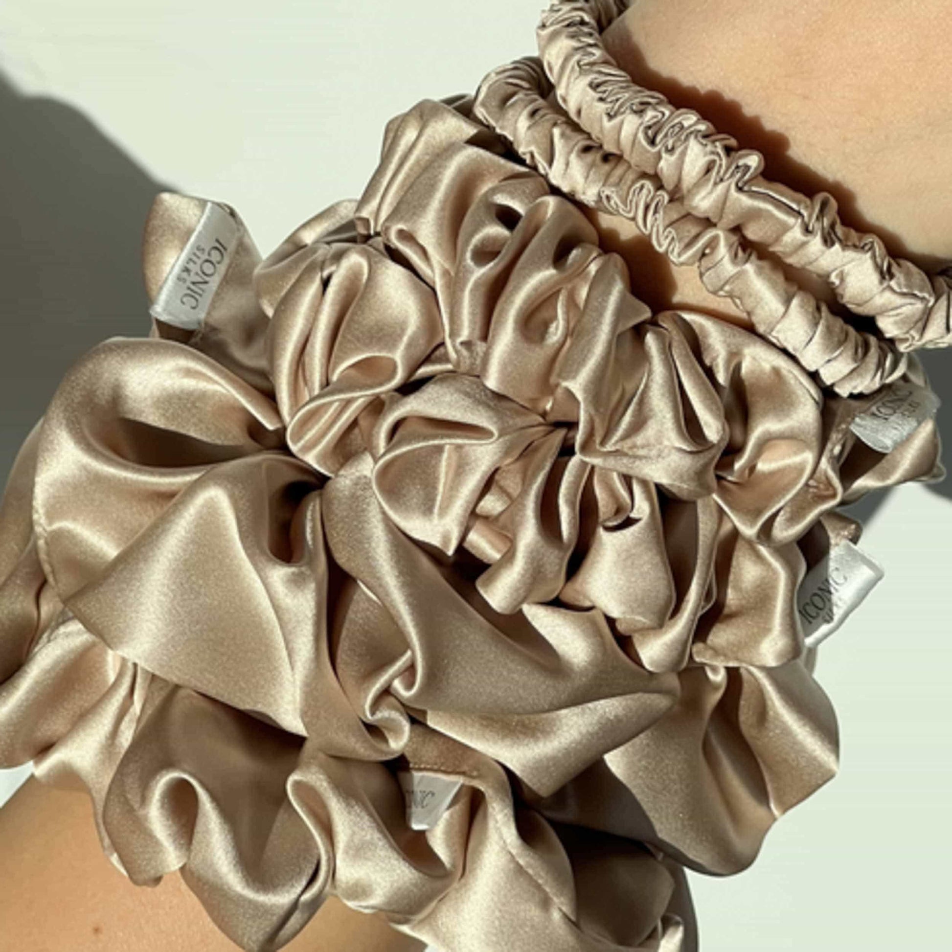 Save yourself from hair breakage and knots and allow our silky scrunchies to improve the quality of your hair's life! We use the highest quality (6A) 100% Mulberry silk that helps to ensure your endless experience. Antibacterial, hypoallergenic, and Hyaluronic Acid infused scrunchies.